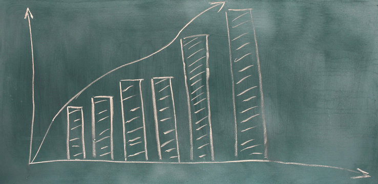 Growth chart is drawn on the blackboard isolated on white