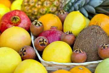 Fresh tropical fruits in the wicker basket