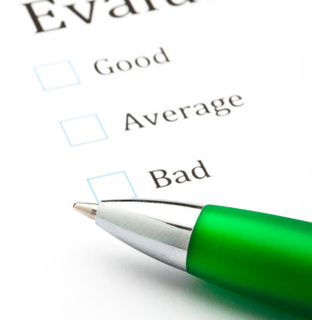 quality questionnaire and pen, extreme closeup photo