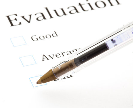 quality questionnaire and pen, extreme closeup photo