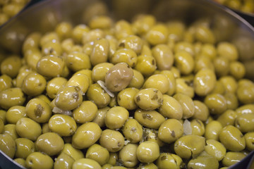 spicy green olives with garlic and herbs