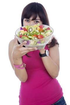 Healthy girl with salad
