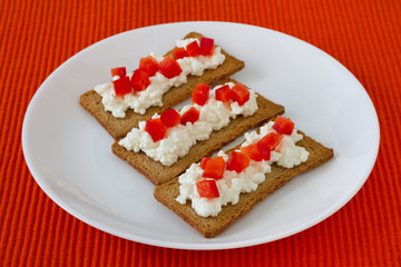 toasts with cottage cheese and red pepper