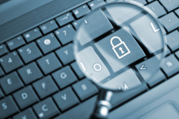 Magnifying glass focused on lock