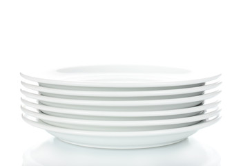empty plates isolated on white - Powered by Adobe