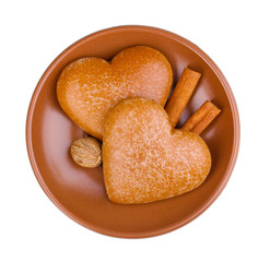 Heart-shaped cookies with cinnamon and nutmeg
