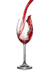 Splash of wine in glass isolated on white