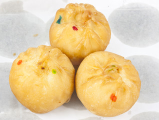 Dessert made of flour stuffed on oil clear sheet