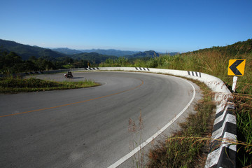 danger curve road on mountain.
