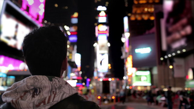 Times Square Tourist Snaps off Shot with Smart Phone
