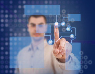 Man pressing modern touch screen