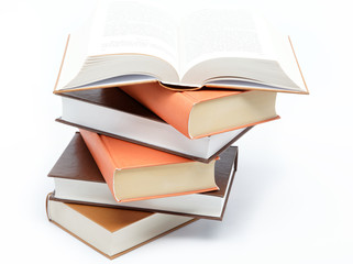 A stack of books on a white background.