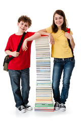 Students standing close to pile of books on white