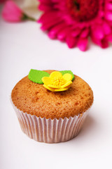 Cupcake with yellow flower
