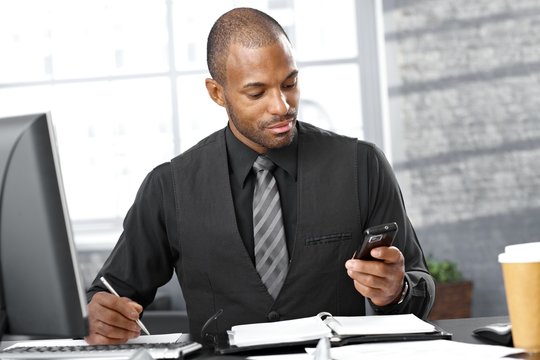 Smart businessman busy working