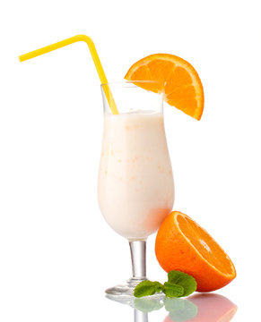 Bunch of bananas and milk cocktail isolated on white