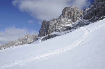 snowy slopes under rosengarten, dolomites