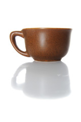 teacup and shadow over white