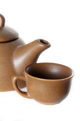 teapot and teacup over white