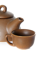 teapot and teacup over white