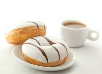 Donuts with cup of coffee
