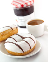 Donuts with cup of coffee