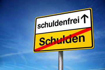 Obraz premium Schuldenfrei Schulden Ortsschild