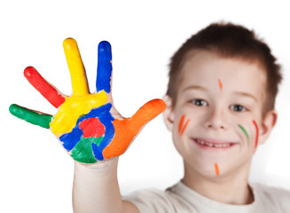 child showing his colored hands