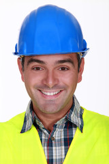 Cheering construction worker