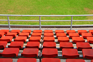 grand stand, orange seat in stadium. in horizontal.
