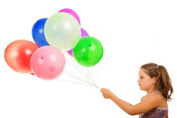 Fototapeta na wymiar studio picture from a little girl with balloons, isolated on whi