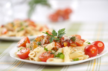 Italian pasta with sauce and parmesan cheese