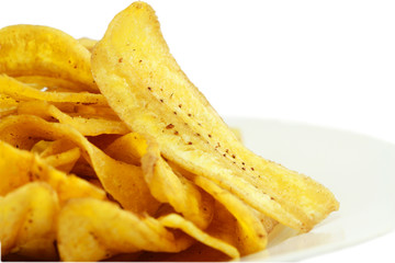 Fried thinly sliced banana chips, a tropical snack © bajita111122