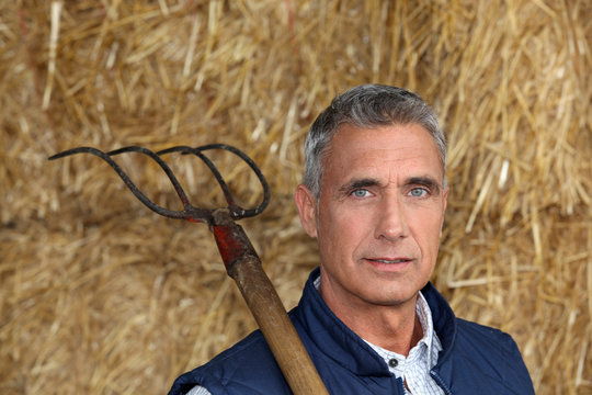 Farmer holding a pitchfork