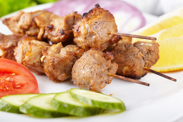 Pork shashlik with fresh vegetables