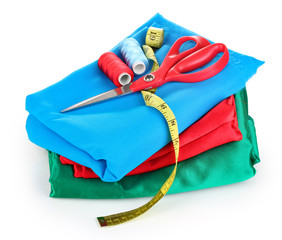 Scissors, bright thread and measuring tape