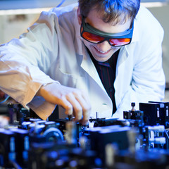 scientist doing research in a quantum optics  lab