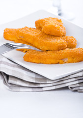 Fried fish sticks. Bastoncini di pesce.