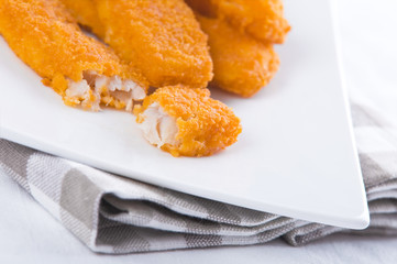 Fried fish sticks. Bastoncini di pesce.