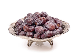Natural dates in a metal container