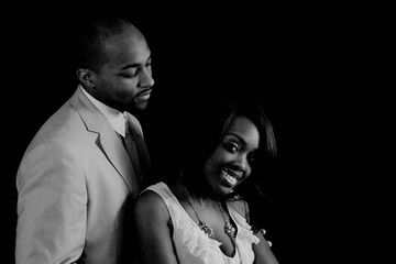 Romantic black couple together with friendly expressions