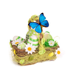 Colorful painted easter eggs in brown basket