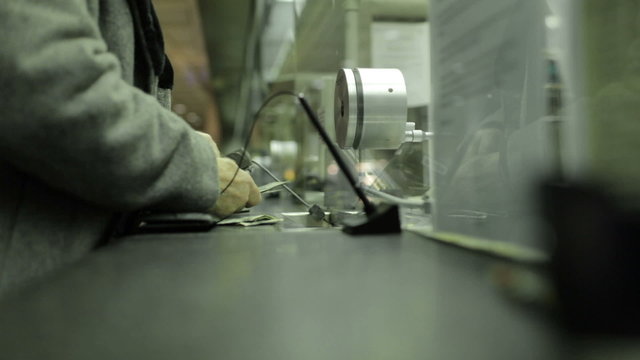 Man Paying in Cash