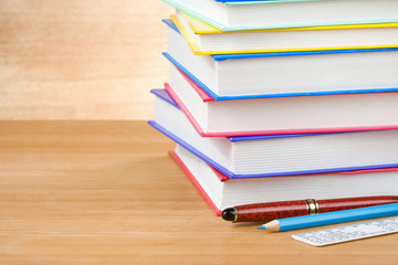 pile of books on wood