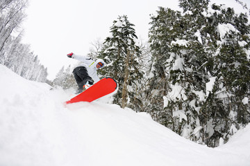 snowboarder on fresh deep snow
