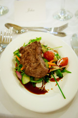 Beef steak with salad