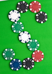Counters for game in a casino on зелоном a background