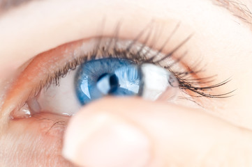 beautiful human eye and contact lens