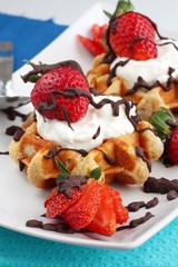 Strawberry waffles with cream