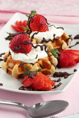 Strawberry waffles with cream